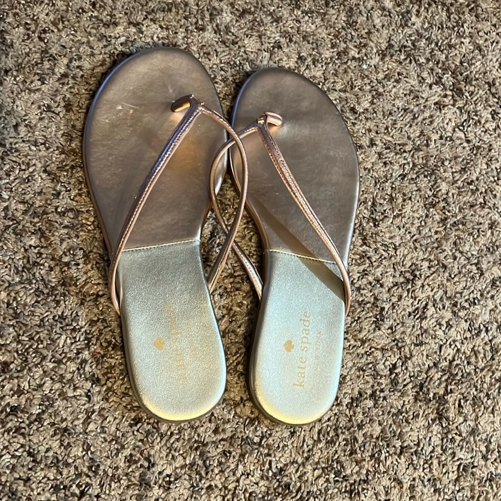 Kate Spade flip flops. Only wore a few times.